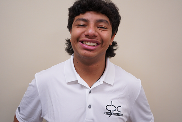 hotograph of Julian Sosa in white GBC polo.