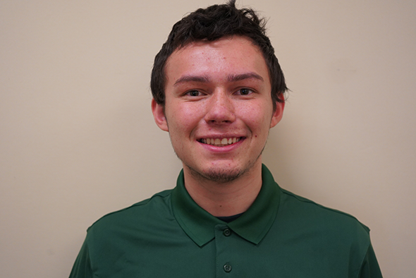 Photograph of Storm Raine in green GBC polo.