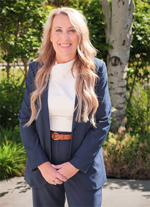 Photo of Interim President, Dr. Amber Donnelli outside.