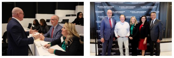 An audience listens to a speaker.